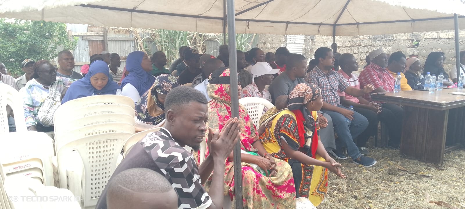 Residents, partners and youth at the harvest